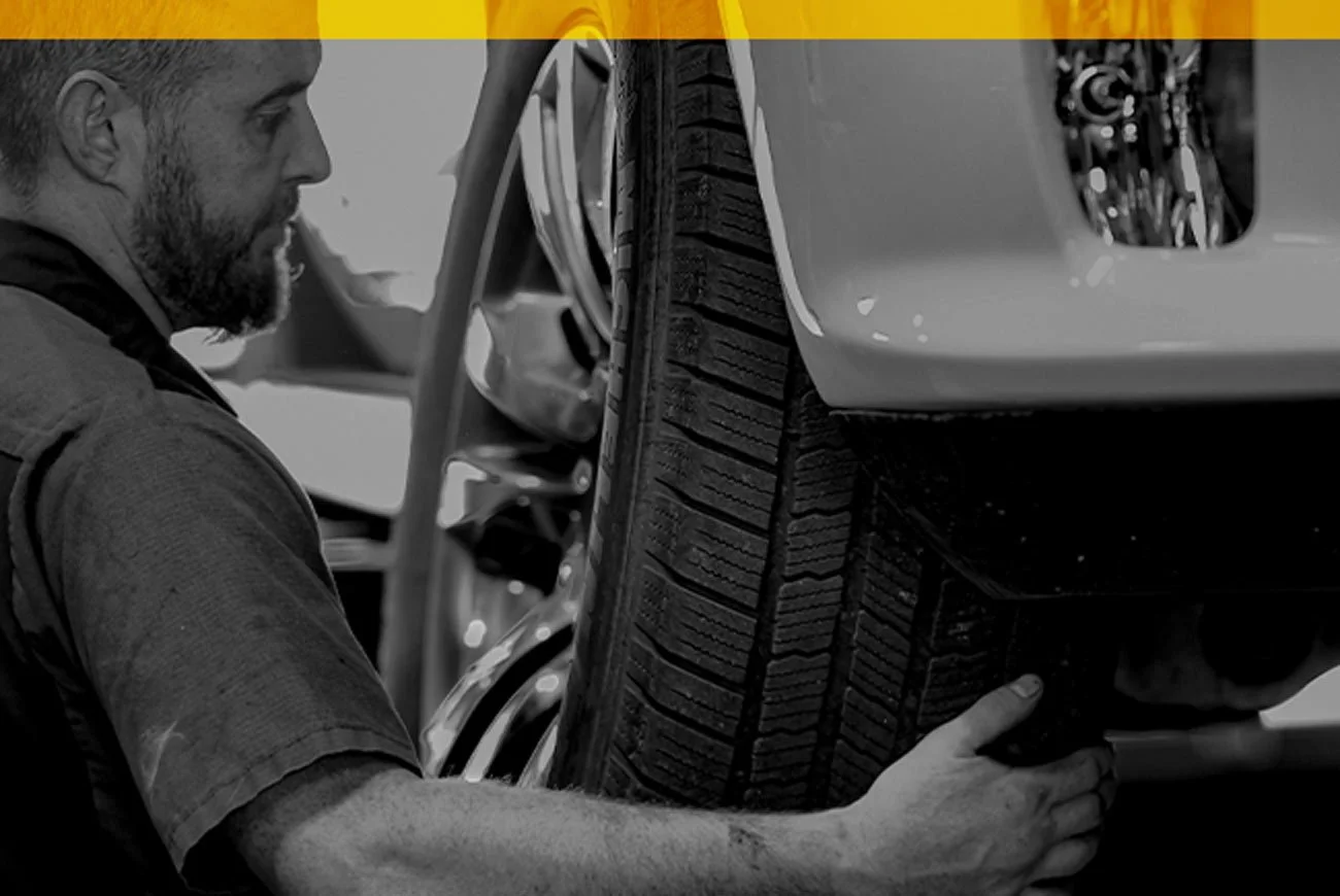 Mechanic doing tire rotation